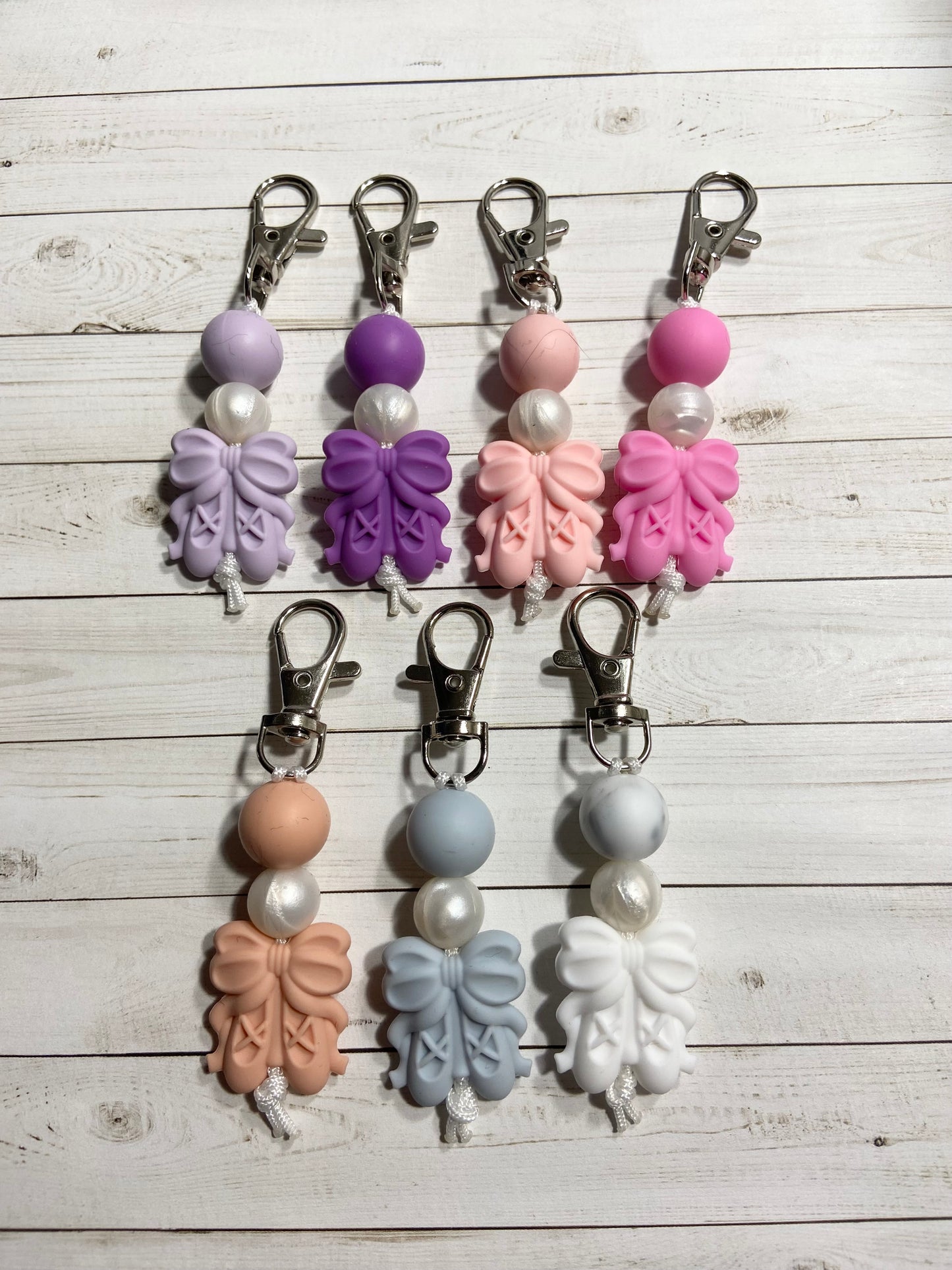 Dancing Zipper Pulls