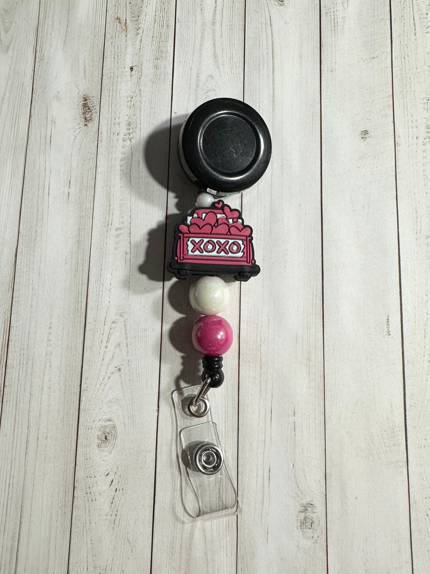 XOXO Truck Badge Reel